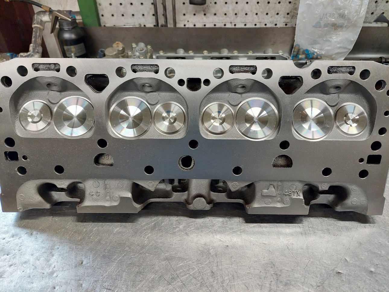 Cylinder head with new valves on a bench
